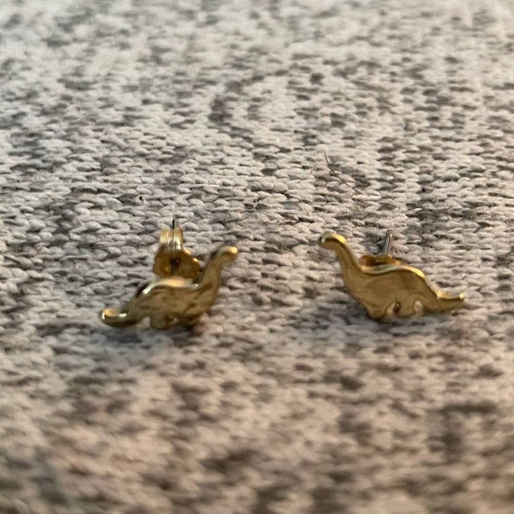 Gold plated dinosaur studs